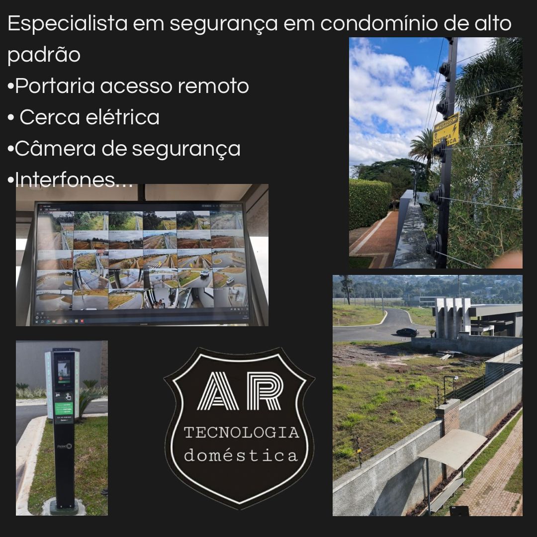 Detalhe de uma cerca elétrica industrial com placas de aviso.